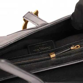 Diôr 
Sac à main Très bon état 
Noir