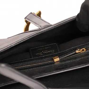 Diôr 
Sac à main Très bon état 
Noir