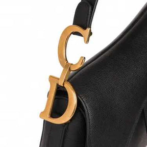 Diôr 
Sac à main Très bon état 
Noir