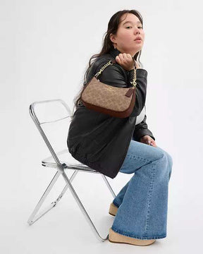 Co@ch Sac épaule Teri en toile exclusive