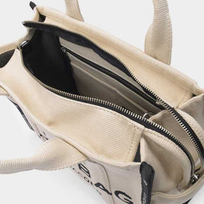 M@rc Jacôbs 
The Medium Tote Bag Jacquard