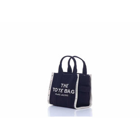 M@rc Jacôbs 
THE TOTE