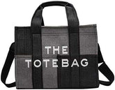 M@rc Jacôbs 
THE TOTE