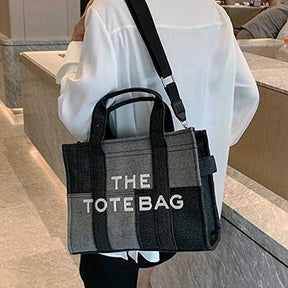 M@rc Jacôbs 
THE TOTE