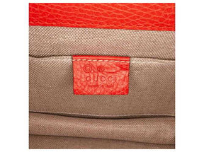 GG Sac à bandoulière orange à petit dollar entrelacé