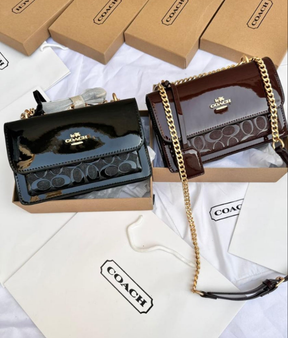 Coach Porté-croisé Klare signature
