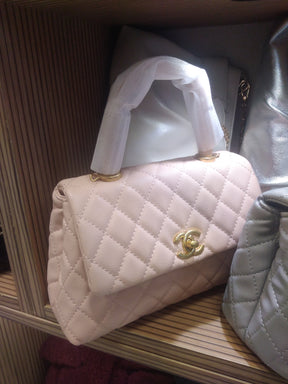 Sac à main Coco Handle
Rose