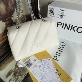PÏNKÔ 
sac porté épaule Love à design matelassé