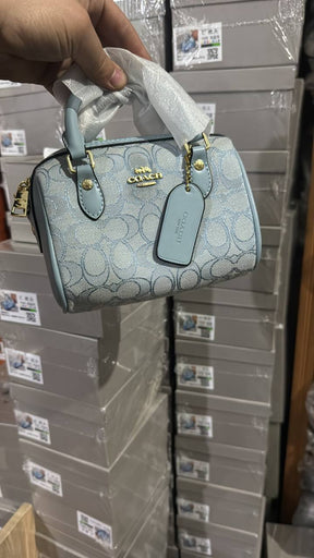 Co@ch Mini Rowan Crossbody In Signature Chambray