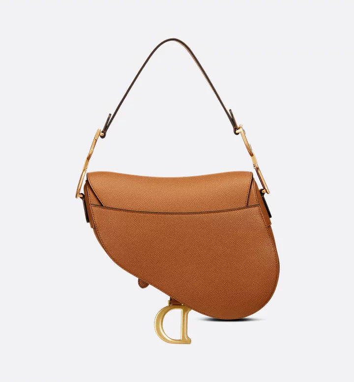 Sac Saddlê à bandoulière de
veau grainé couleur Golden Saddle