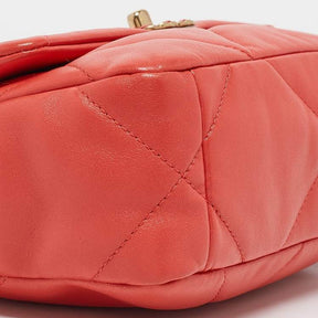 Ch@nel Sac à rabat matelassé orange Chanel 19