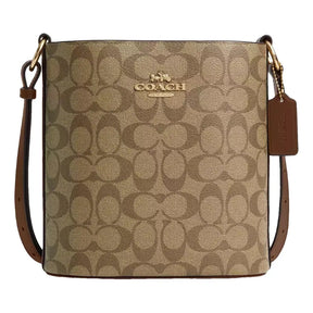 Co@ch Sac seau Sophie en toile signature