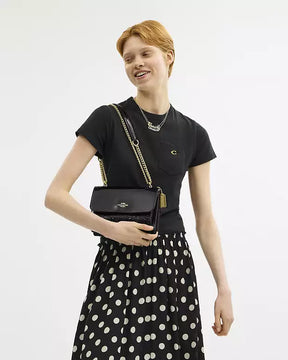 Coach Porté-croisé Klare signature