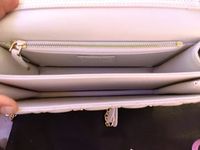 Mini sac My Diôr
d'agneau Cannage blanc et studs dorés Dior Cabinet de Curiosités