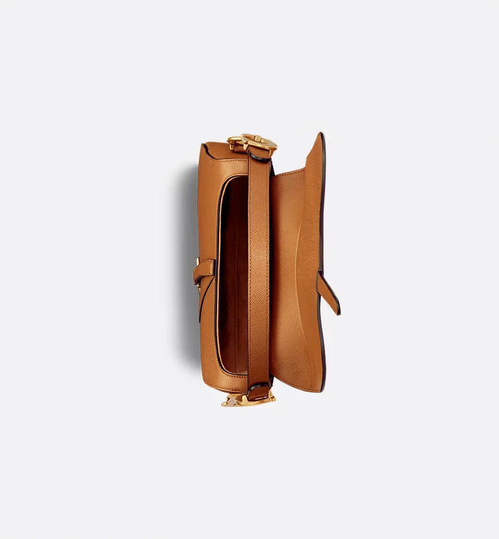 Sac Saddlê à bandoulière de
veau grainé couleur Golden Saddle