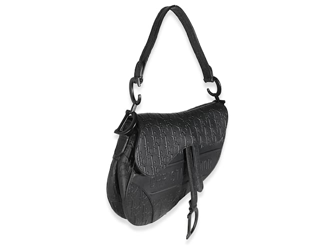 Christian Diôr Sac à dos moyen de veau noir oblique embossé