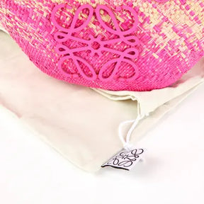 LÔËWE 
Anagram Basket
Rose, Paille