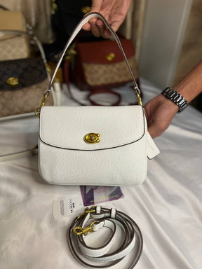 Sac bandoulière Co@ch Cassie 19 pouces couleur craie