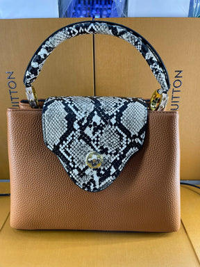 LV Sac à main Capucines 
Marron