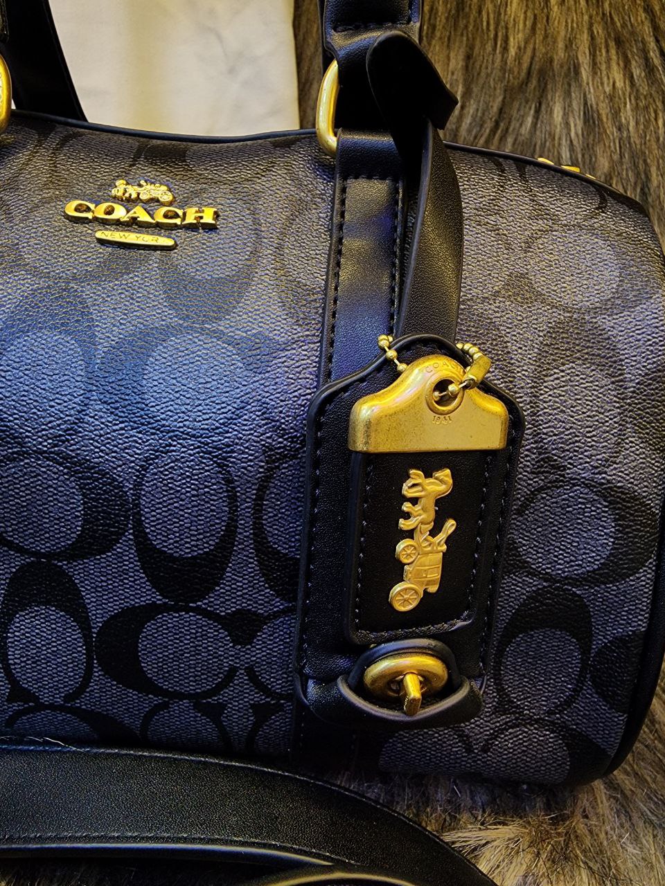 Co@ch sac bandoulière Rowan en toile exclusive