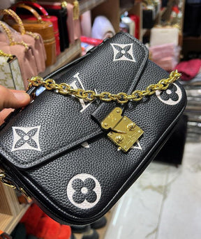 LV Pochette Métis East West