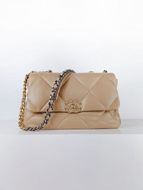 Ch@nel
Sac à main Chanel 19 
Camel