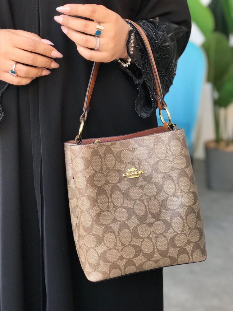 Co@ch Sac seau Sophie en toile signature