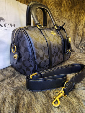 Co@ch sac bandoulière Rowan en toile exclusive