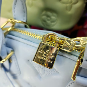 LV Alma BB Matelassé Bleu Glacier