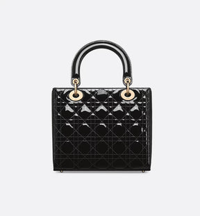 Sac Ladÿ Diôr Medium
de veau Cannage verni noir
