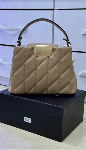 Sac Coach élégant pour femme