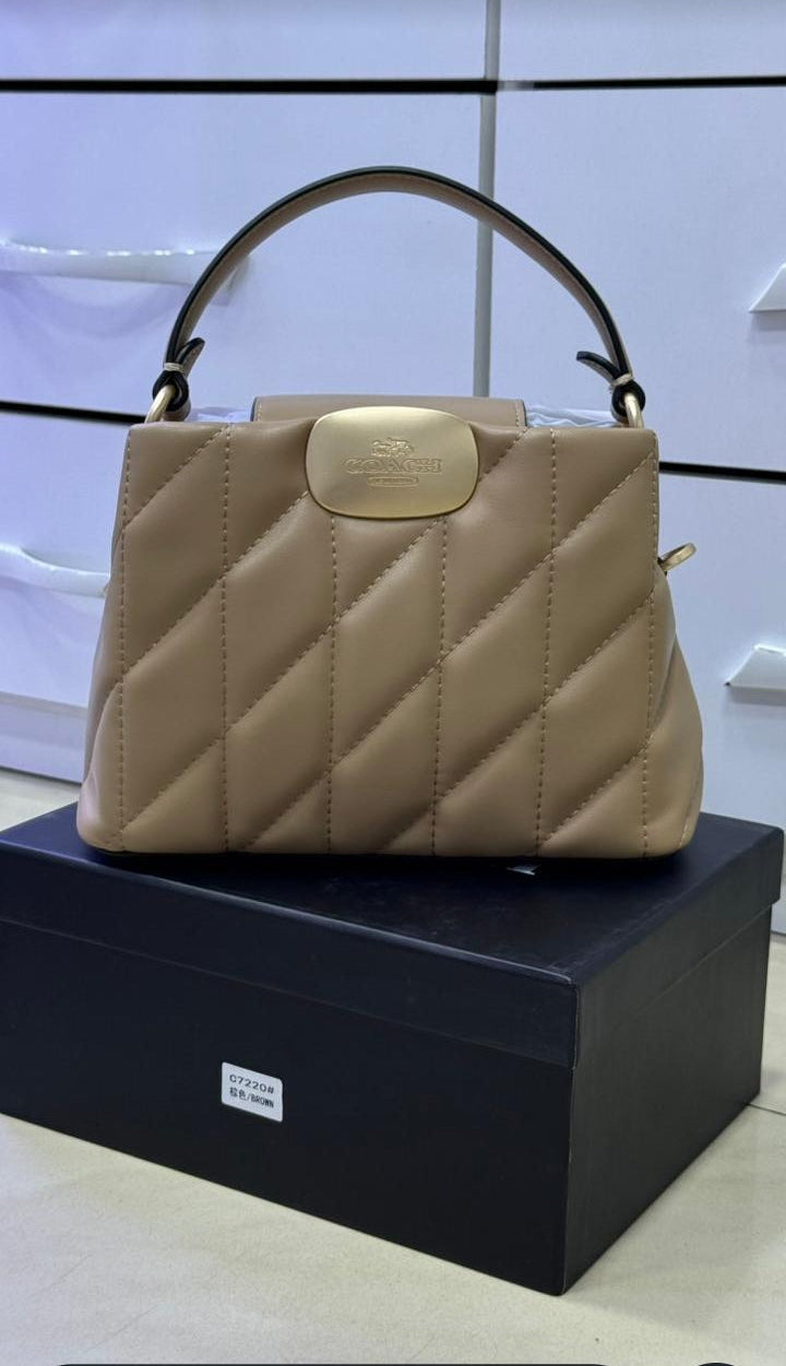 Sac Coach élégant pour femme