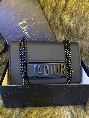 Christian Diôr 
Sac bandoulière Di*r J'Adior  noir mat