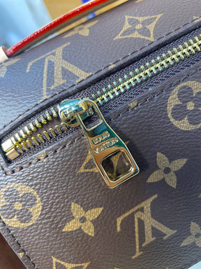 LV Pochette Métis East West En cuir