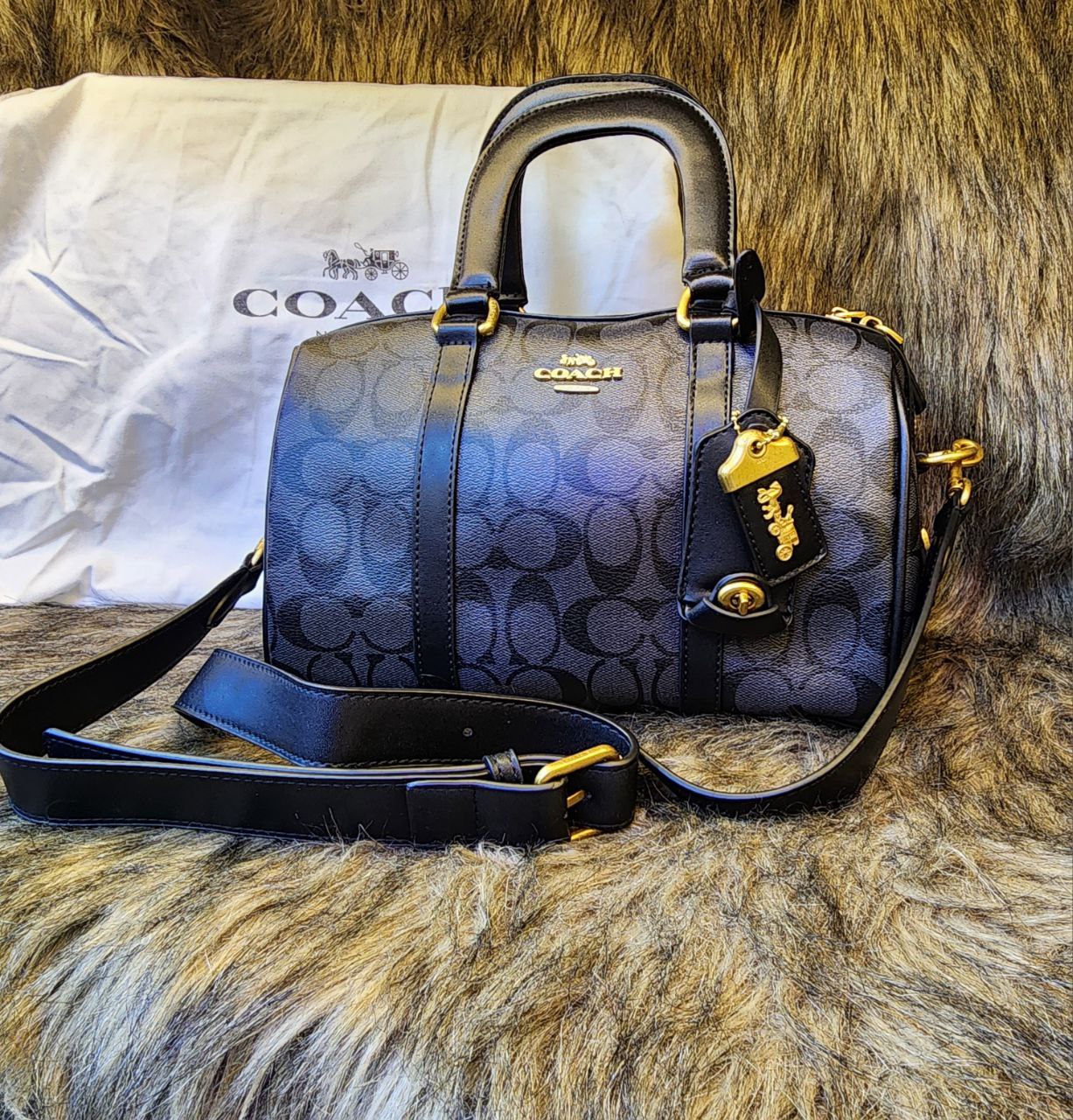 Co@ch sac bandoulière Rowan en toile exclusive