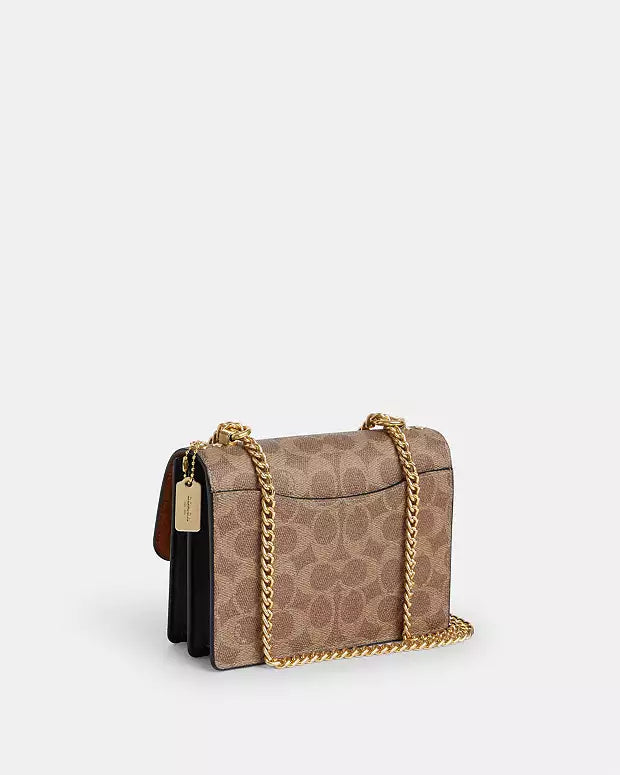 Co@ch Mini sac à porté-croisé Klare en toile signature