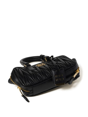 MIÛ MIÛ 
mini sac Arcadie à design matelassé